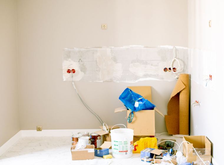 A room part way through a renovation with the outlet boxes roughed in